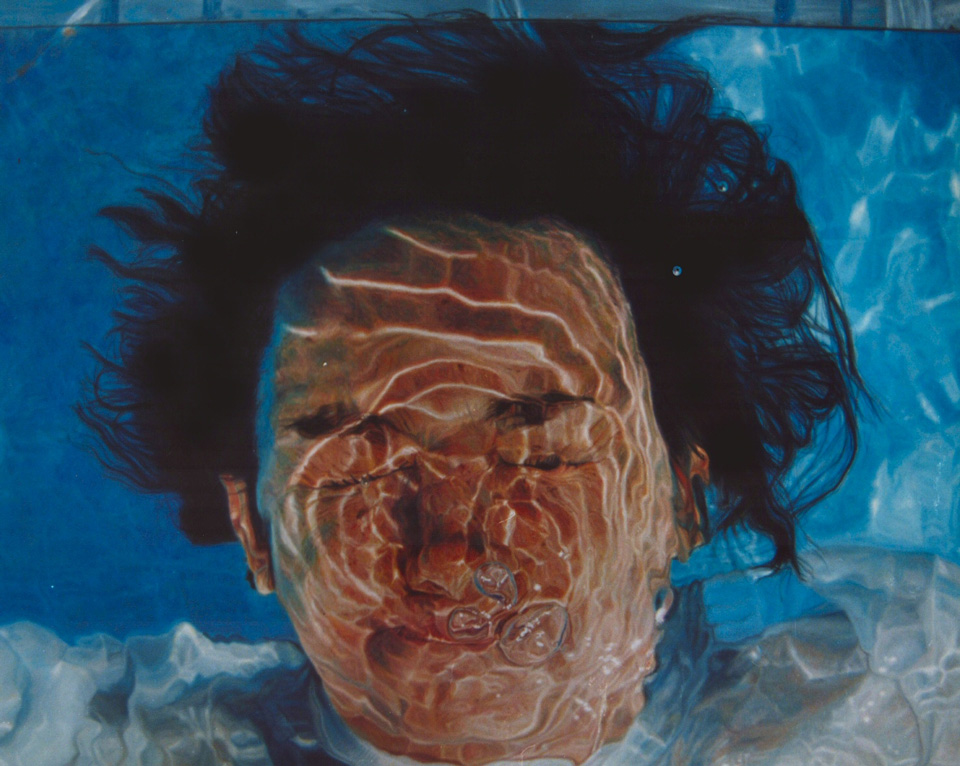 man under water holding his breath