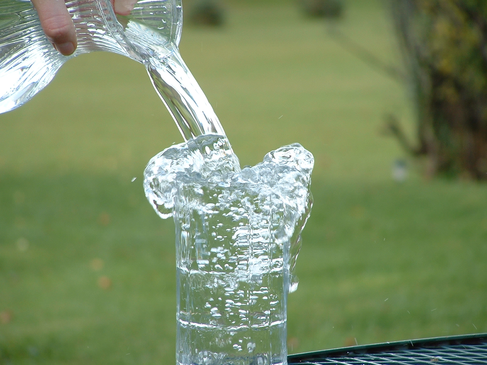 Overflowing glass of water.